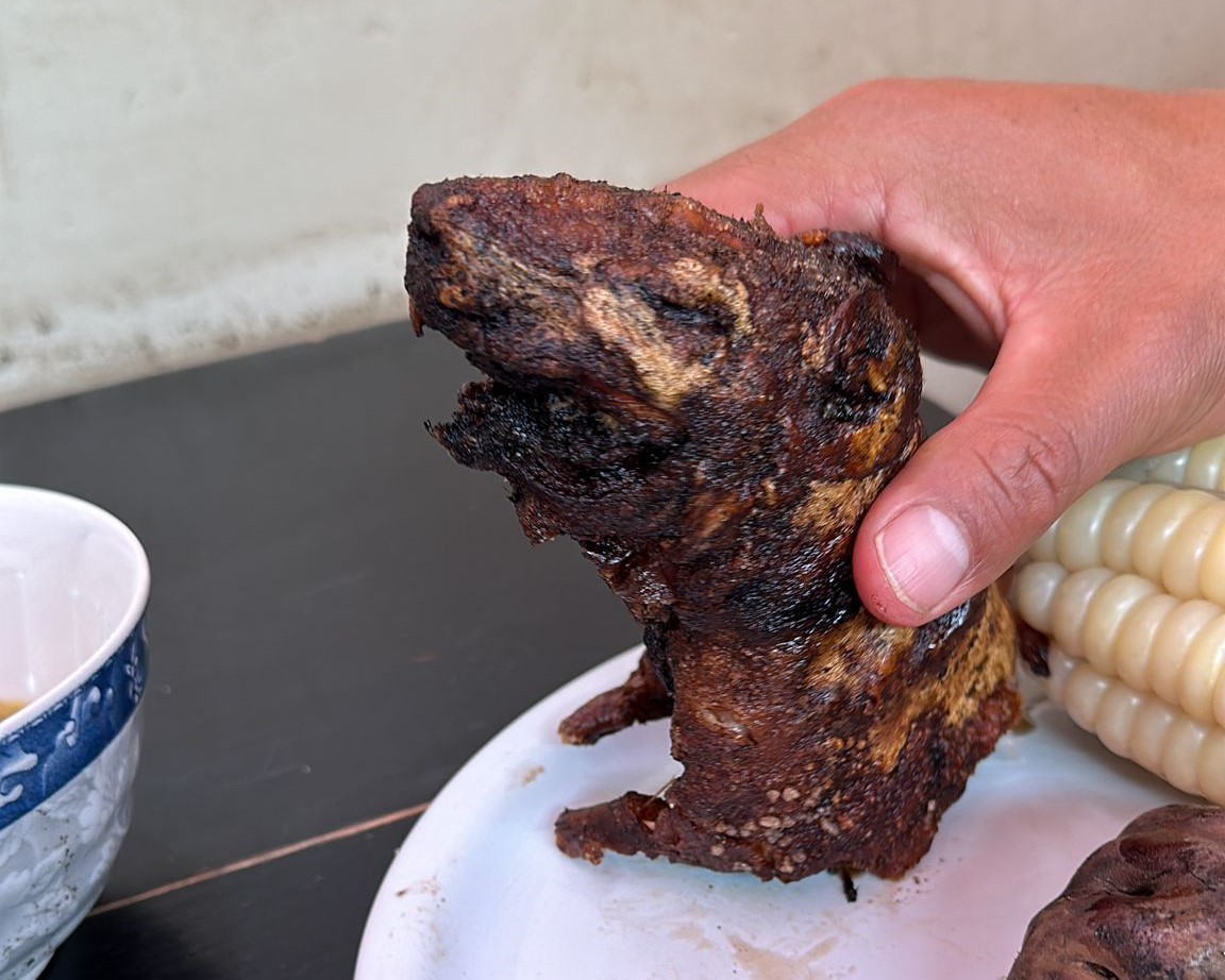 Local custom — cooked cuy, a beloved Andean delicacy