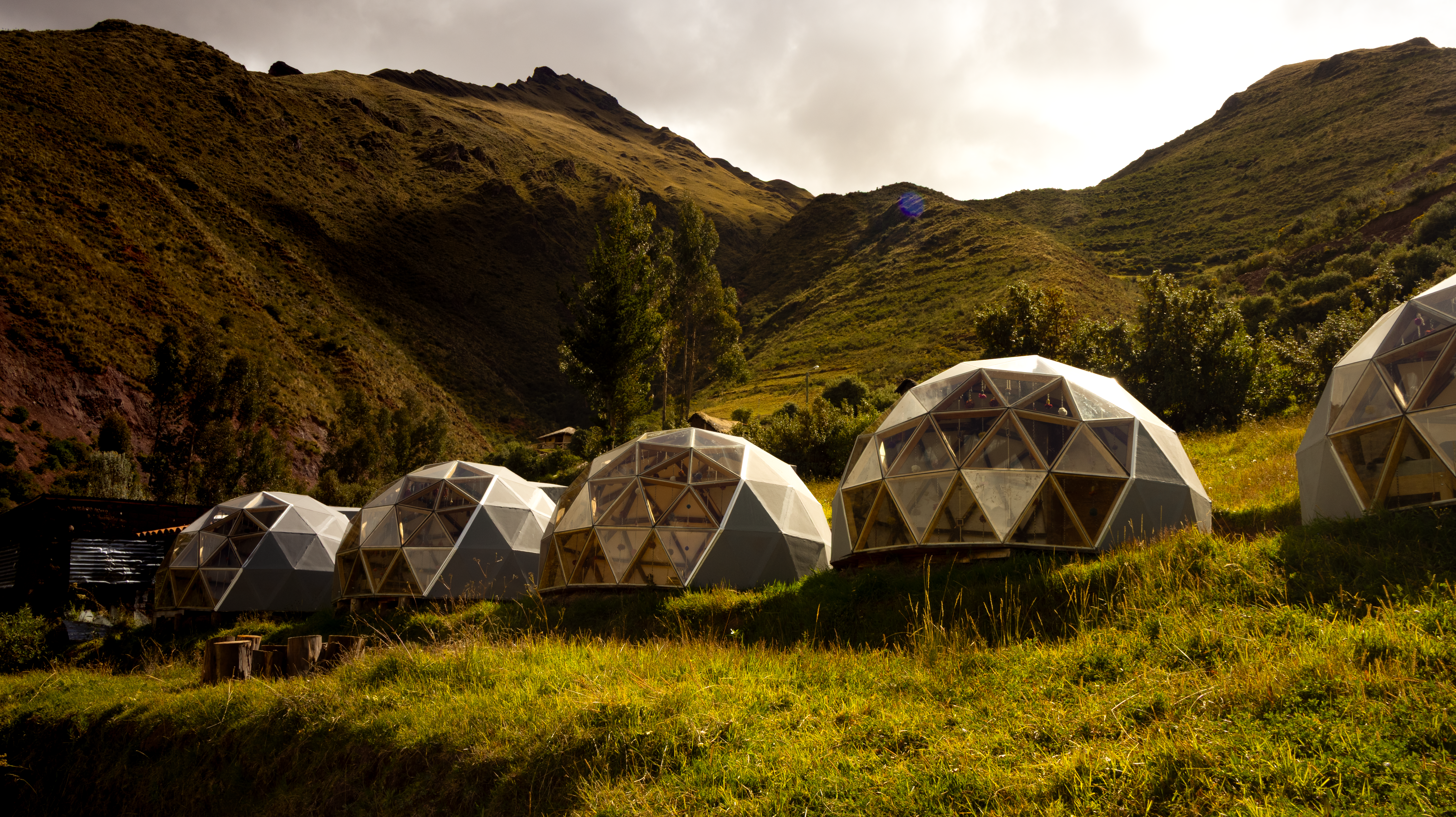 Dome camp with Andean mountains